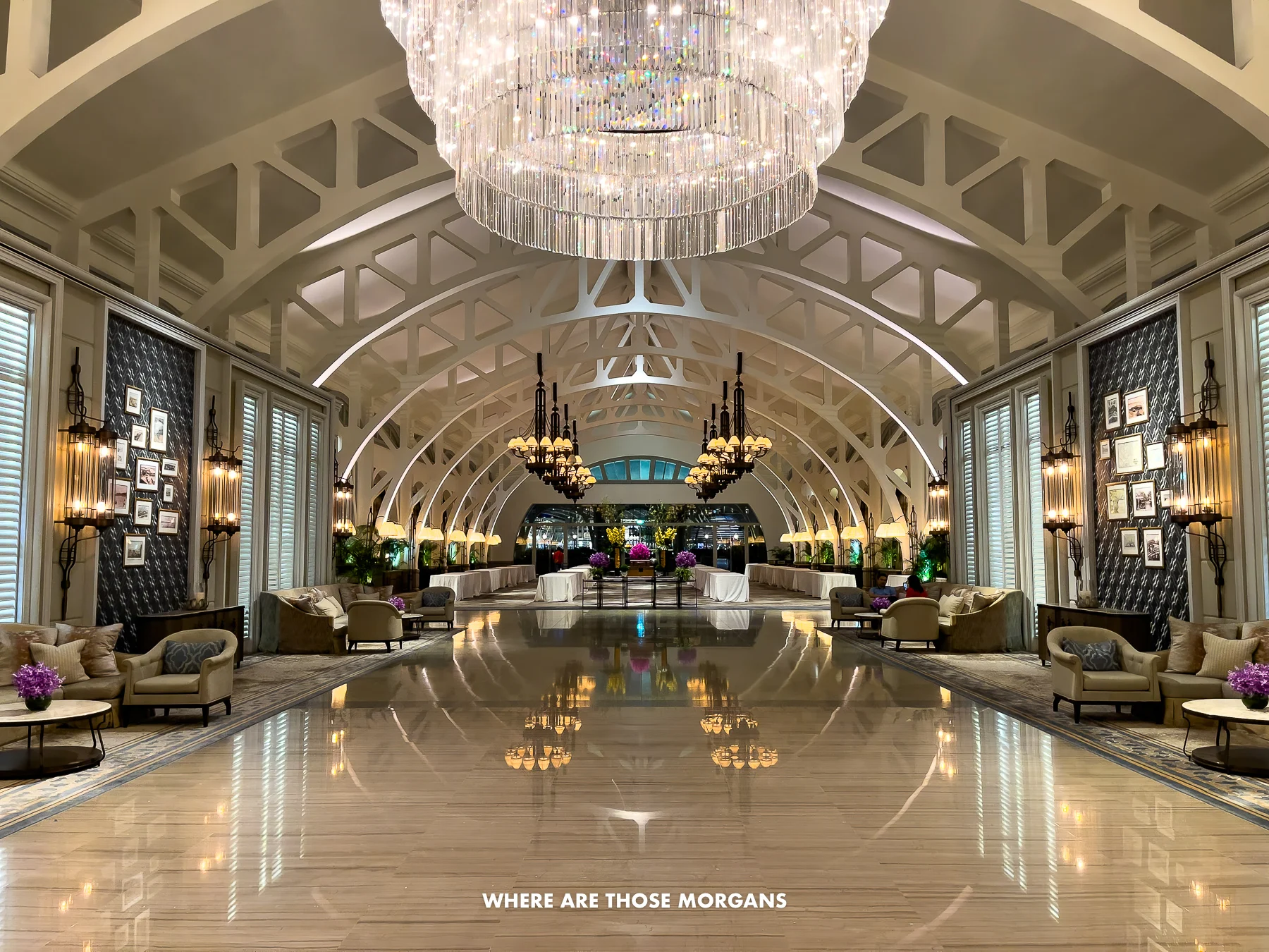 The lobby of a hotel in Singapore with lights and design that make it appear as though you're standing in a tunnel