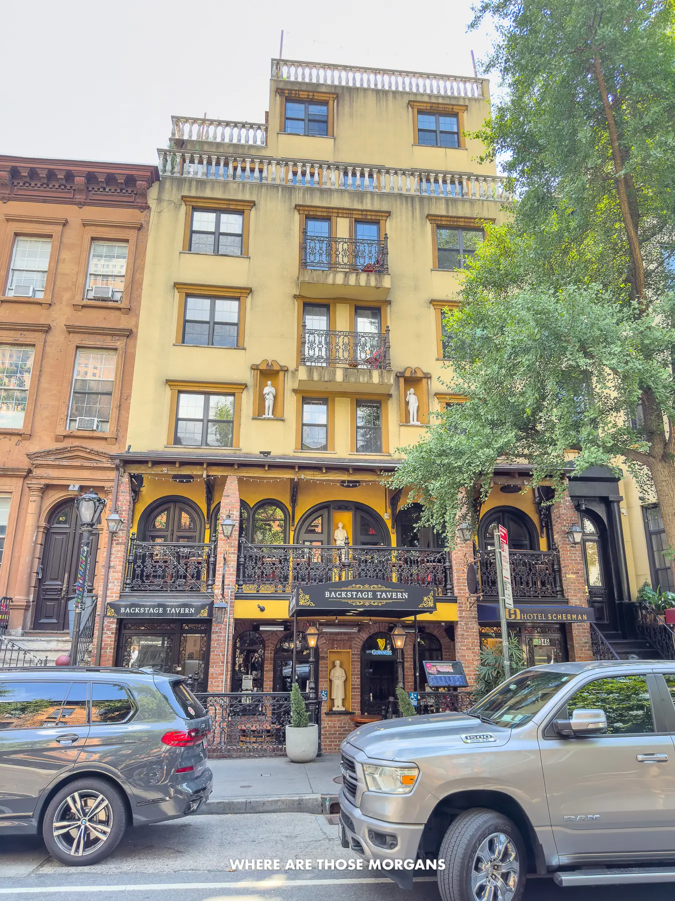 External photo of a boutique hotel in NYC with yellow paint on the building