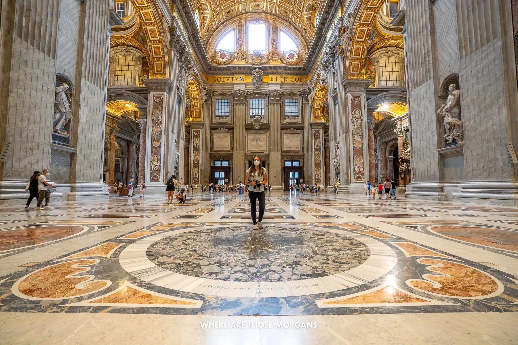 Kristen from Where Are Those Morgans standing inside the massive St Peter's Basilica