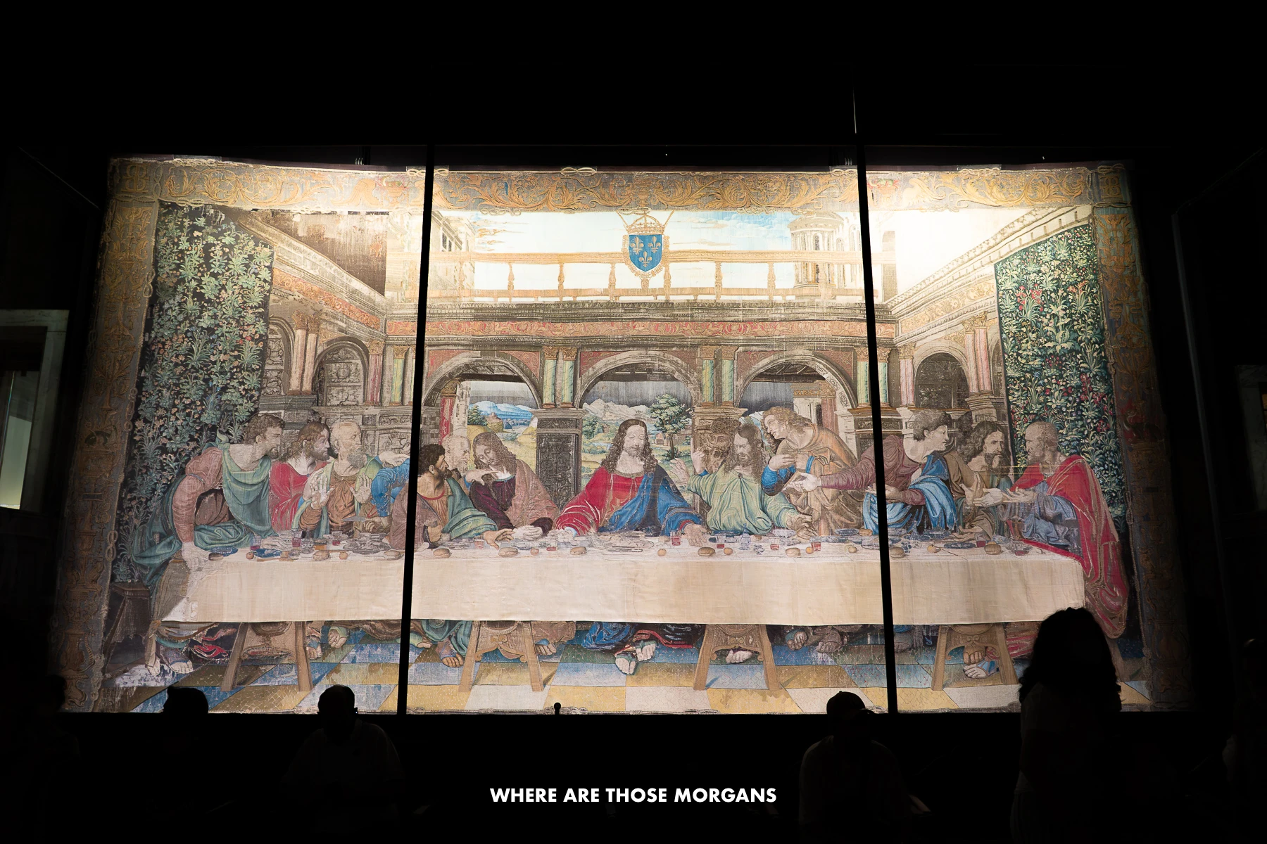 Huge tapestry in a dark room depicting the Last Supper