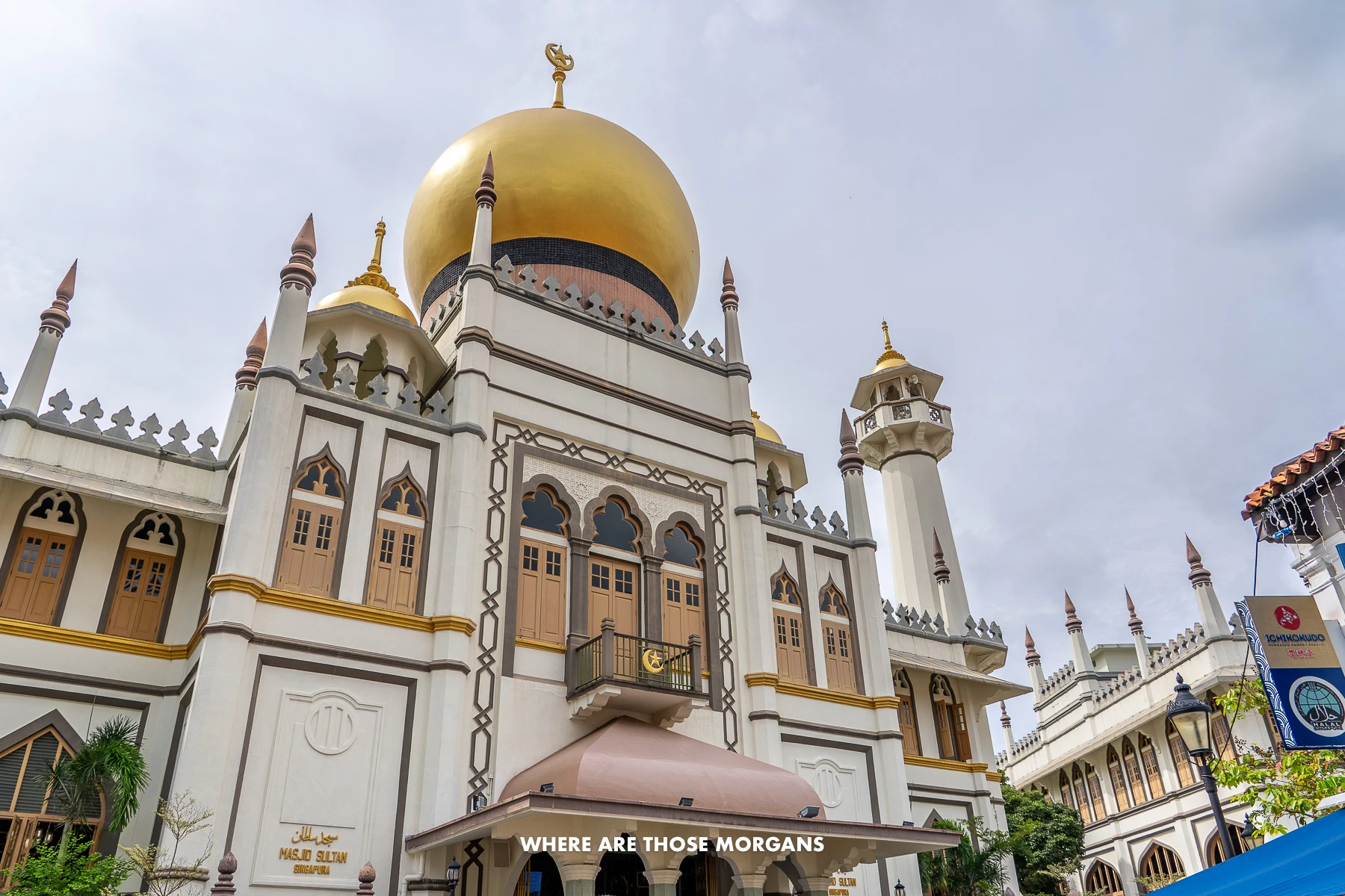 Looking up at Singapore's Sultan Mosque gold domes from below on an angle