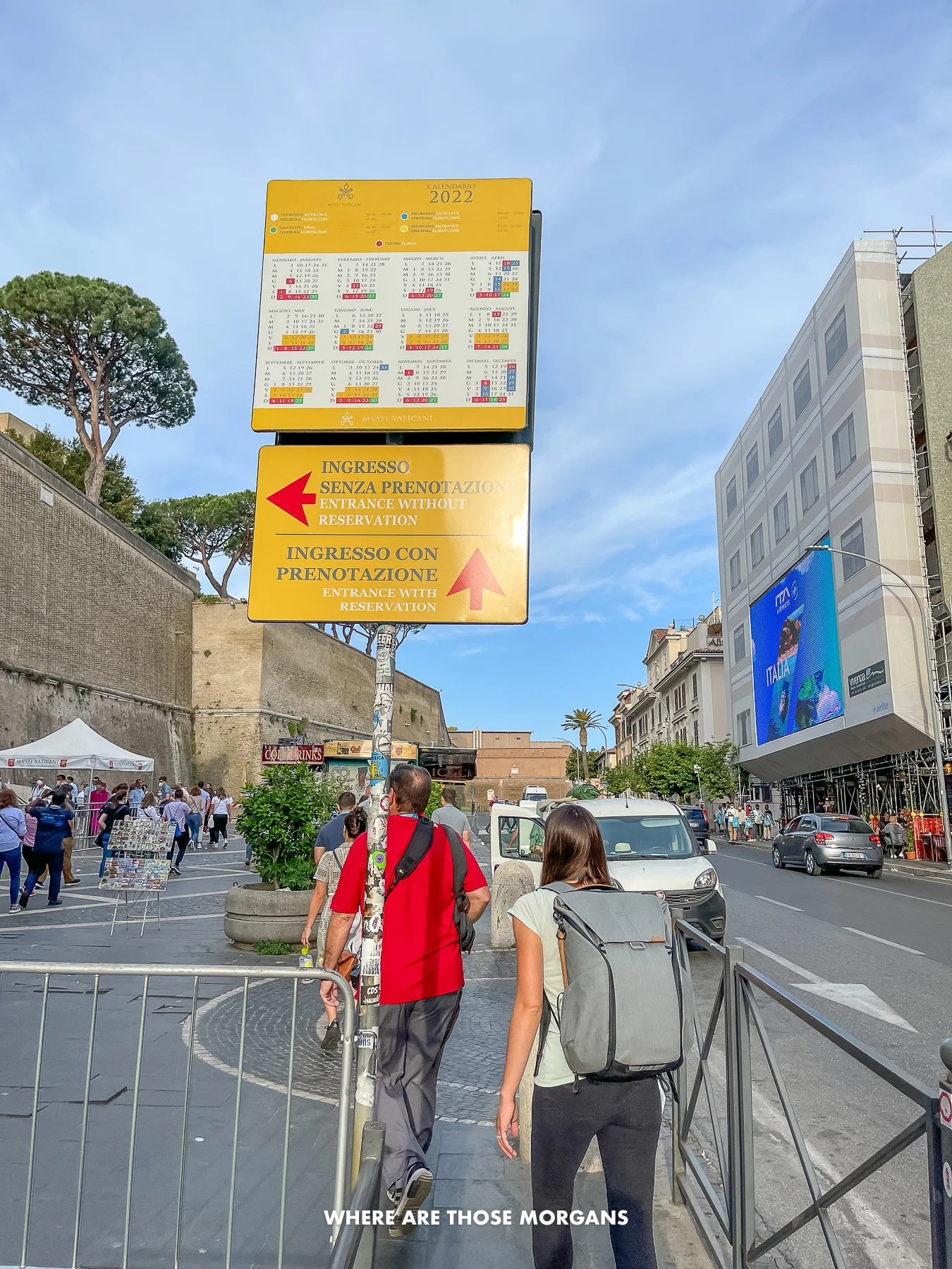 Tourists walking to the correct line for advanced tickets at a museum in Rome
