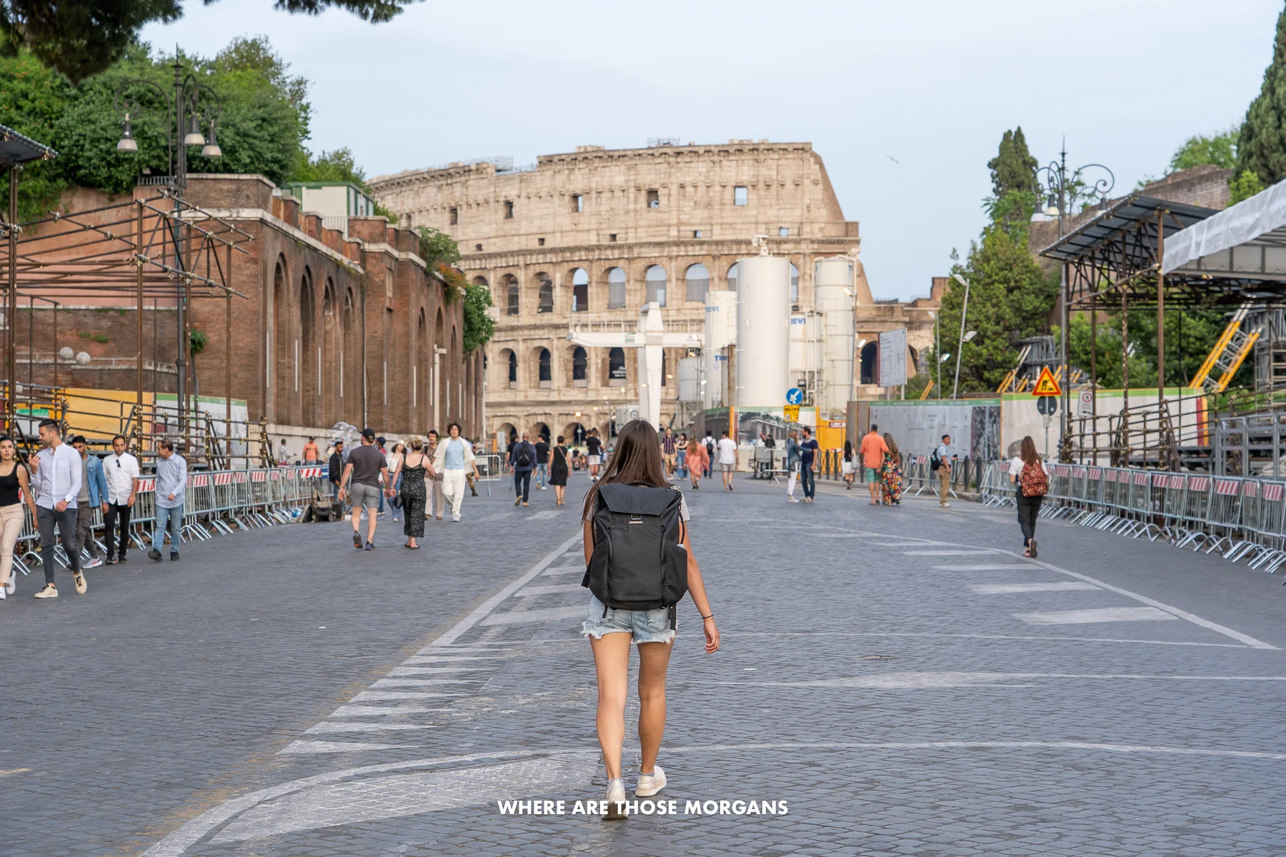 Kristen from Where Are Those Morgans walking along Via dei Fori towards the Colosseum in Rome