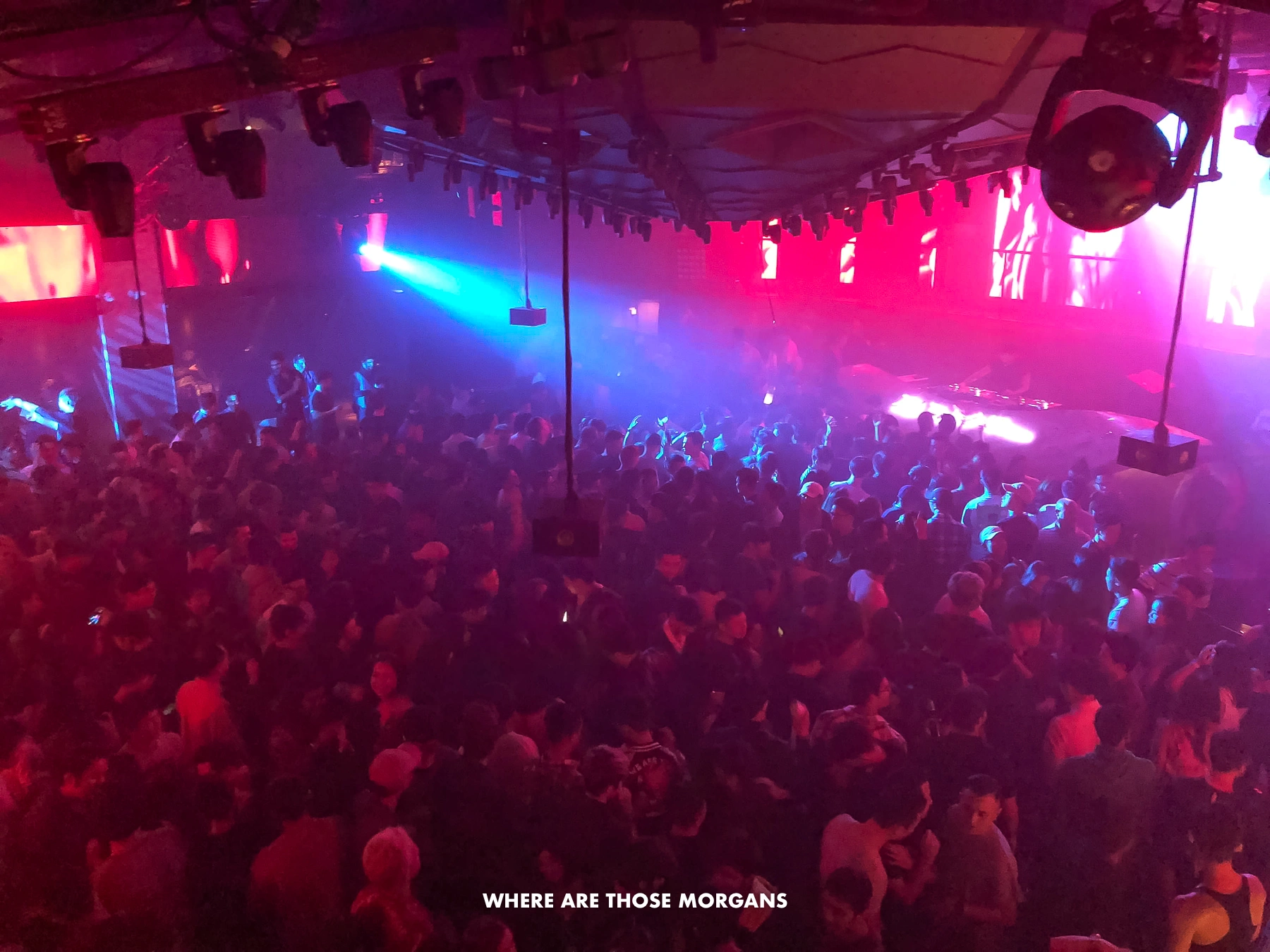 Photo from inside a massive superclub called Zouk in Singapore with lots of people and bright lights