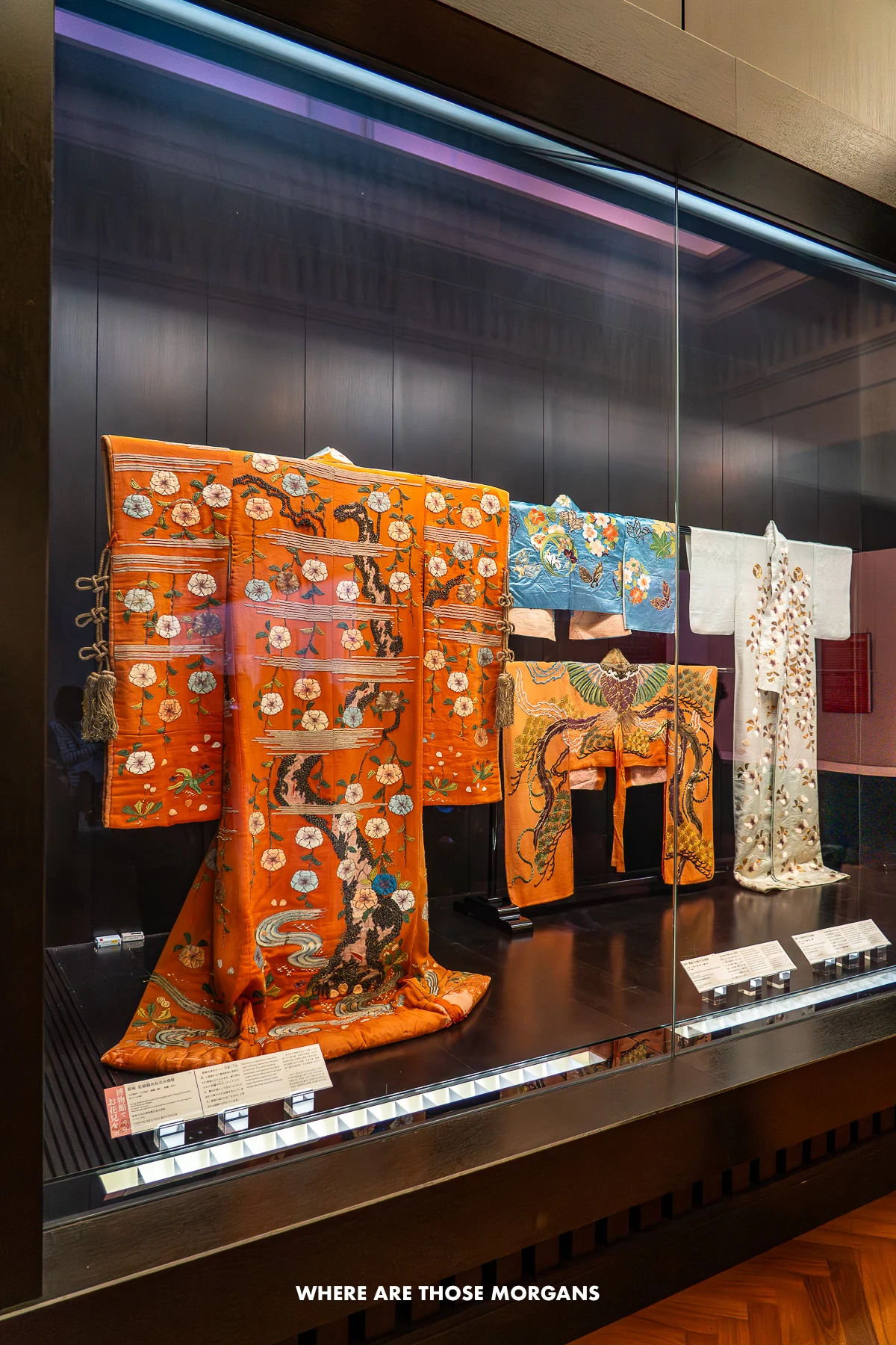 Kimono artifacts inside a glass display in a museum in Japan