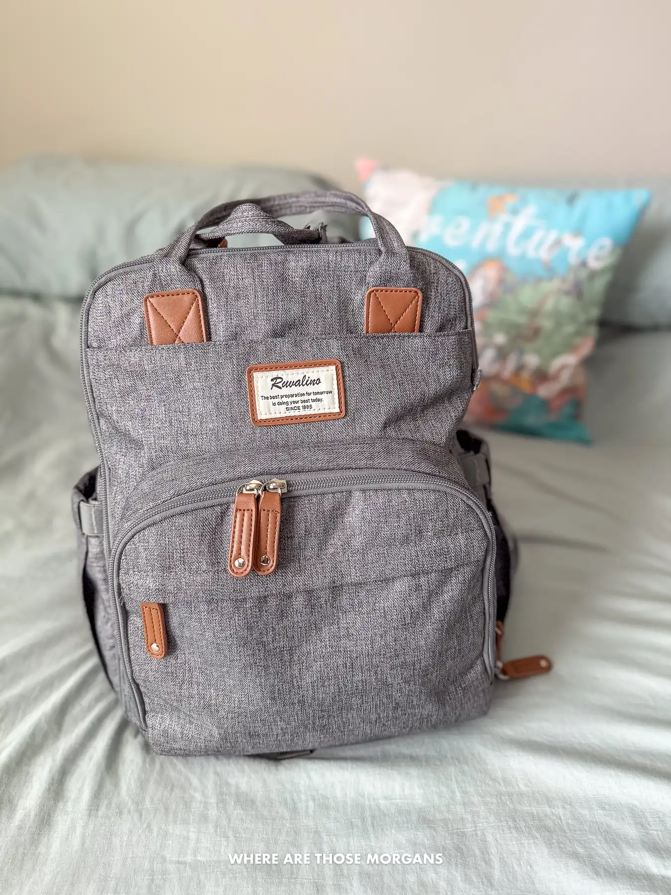 Photo of a baby's diaper bag on a bed
