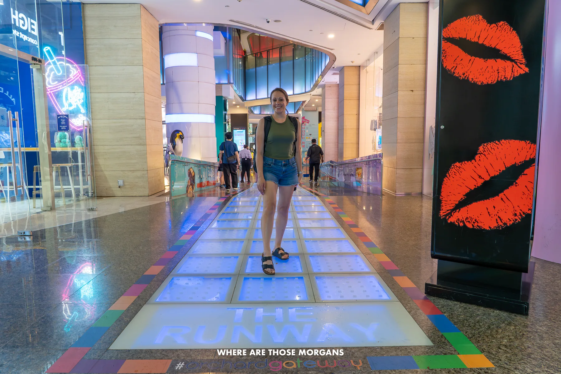 Kristen Morgan wearing Birkenstocks in a shopping mall in Orchard Singapore