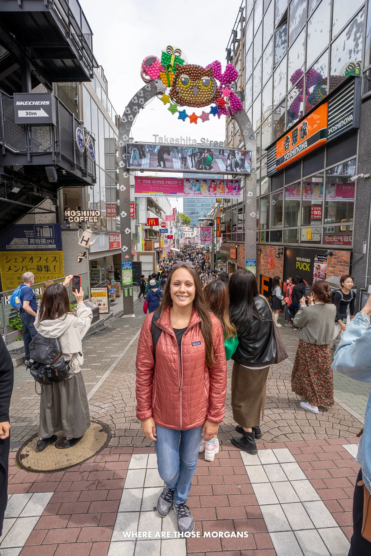 Kristen from Where Are Those Morgans at the entrance to the crowded Takeshita Street in Tokyo