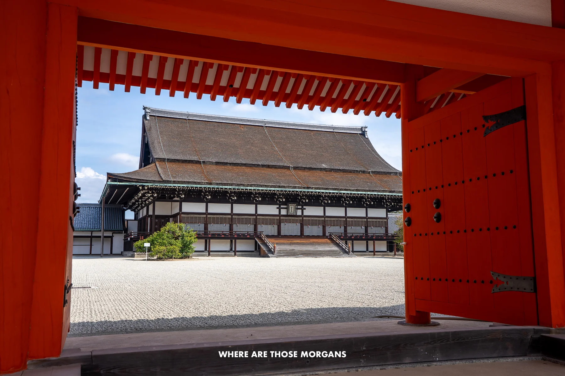 Kyoto Imperial Palace main hall through vermilion red doors and a large courtyard