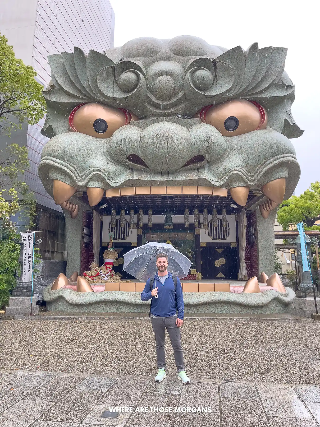 Mark from Where Are Those Morgans standing in front of a huge lion's mouth shaped Shinto shrine in Osaka