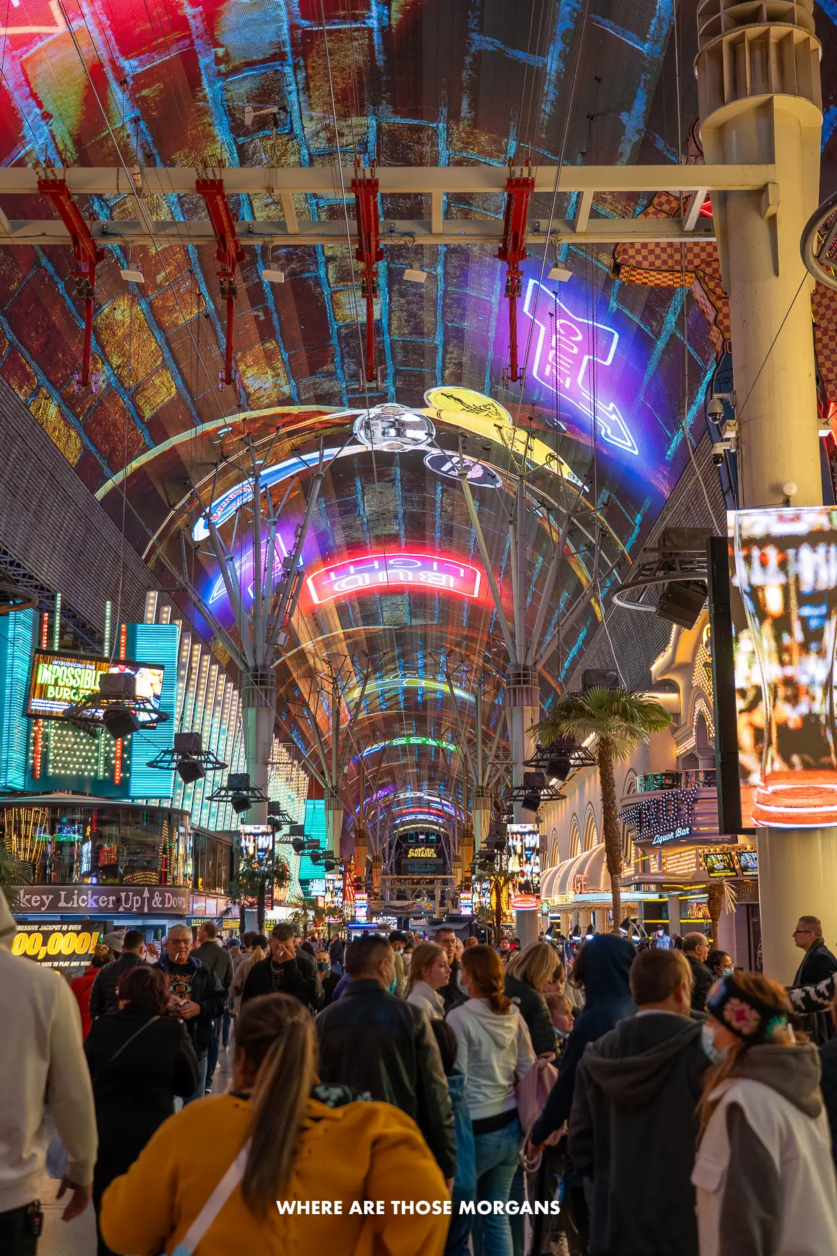 Massive crowds of people walking through an undercover pedestrian area in downtown Las Vegas