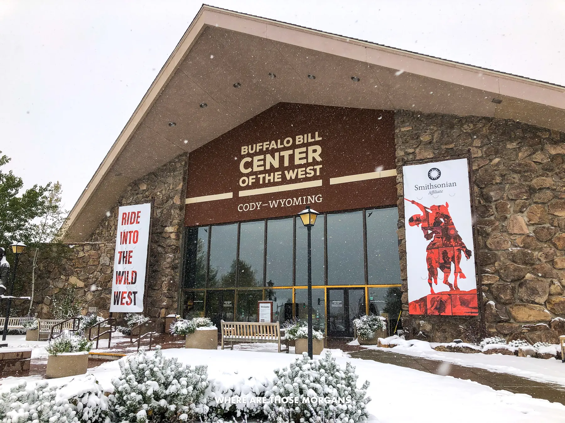 Entrance to the Buffalo Bill Museum of the West on a snowy day in Cody, Wyoming