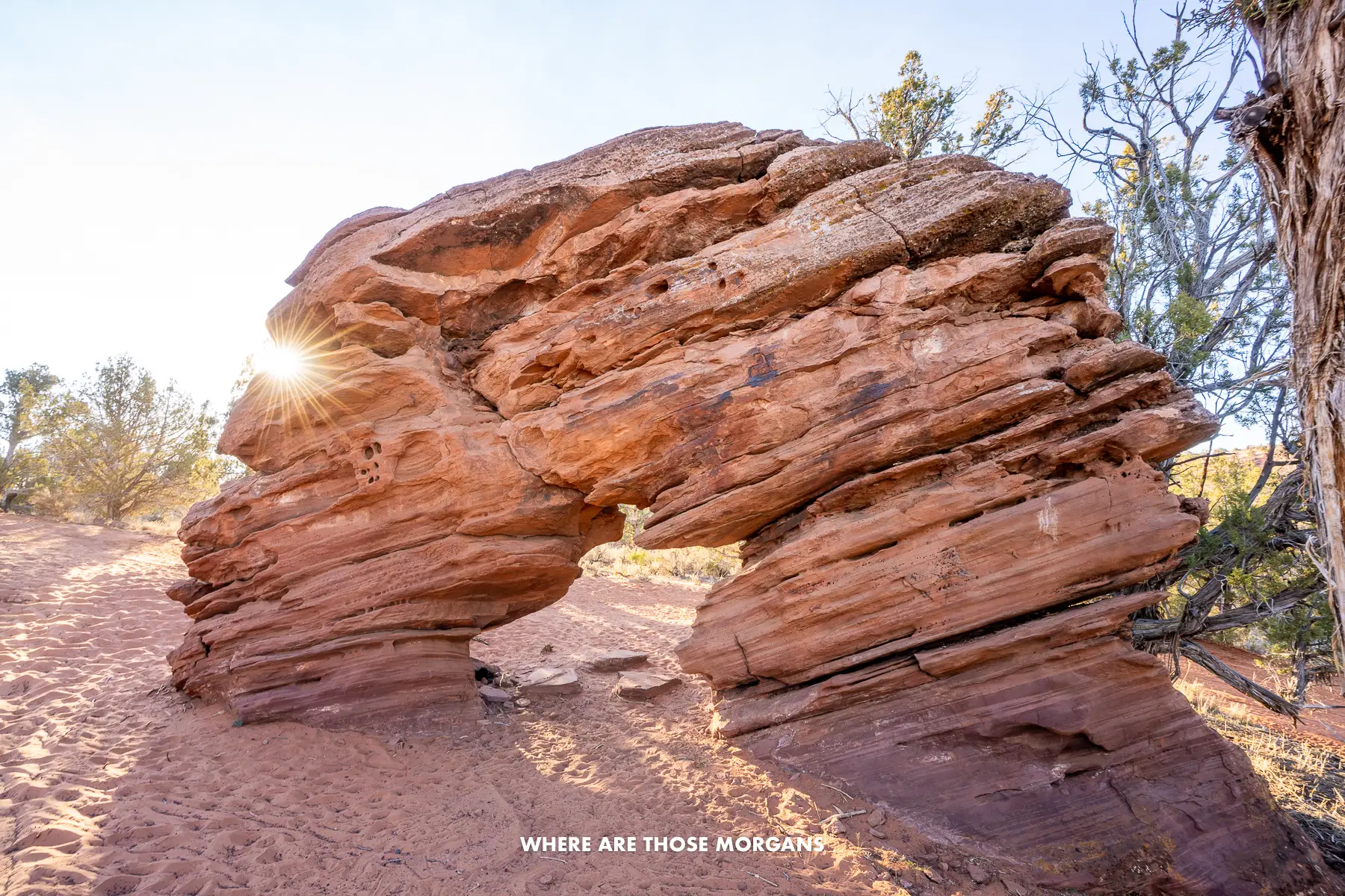 Sand Dune Arch near Kanab with a sunburst not long before sunset