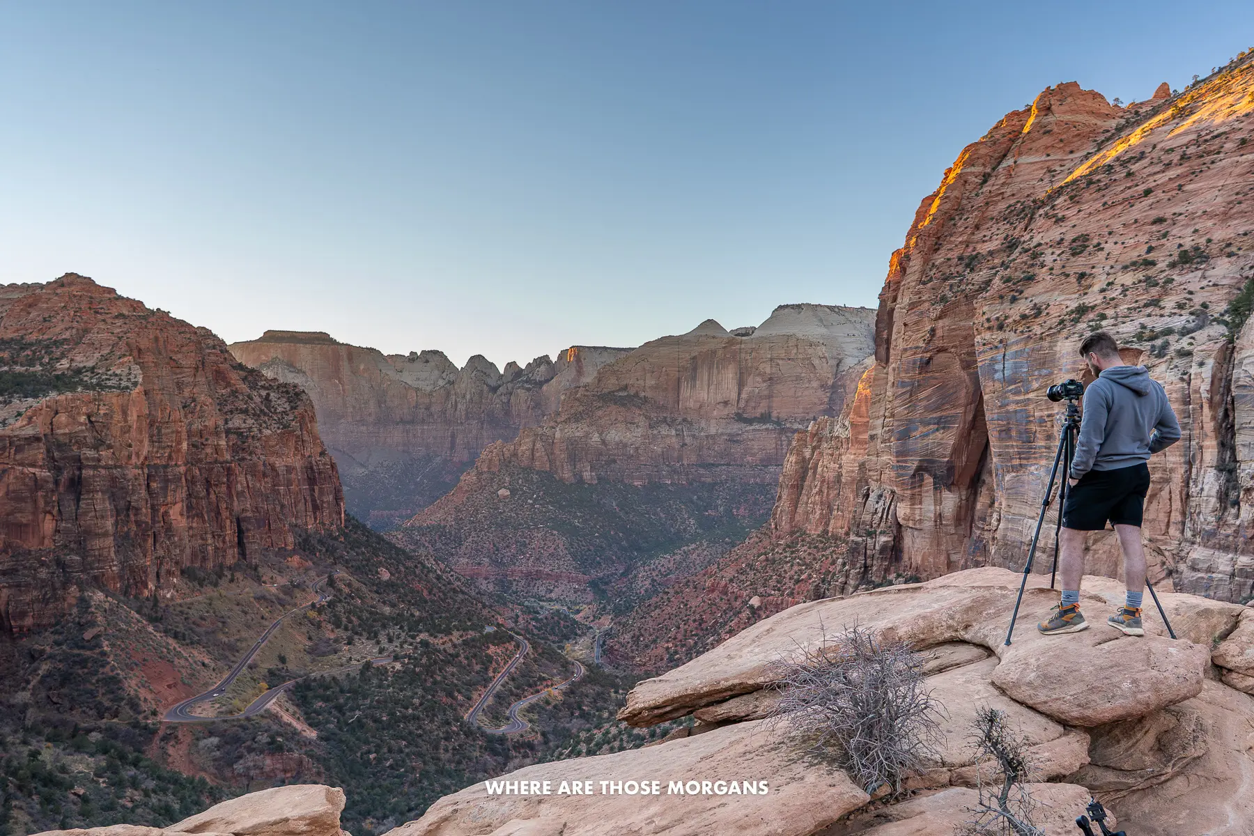 Mark from Where Are Those Morgans standing with a tripod taking photos of Zion's Pine Creek Canyon