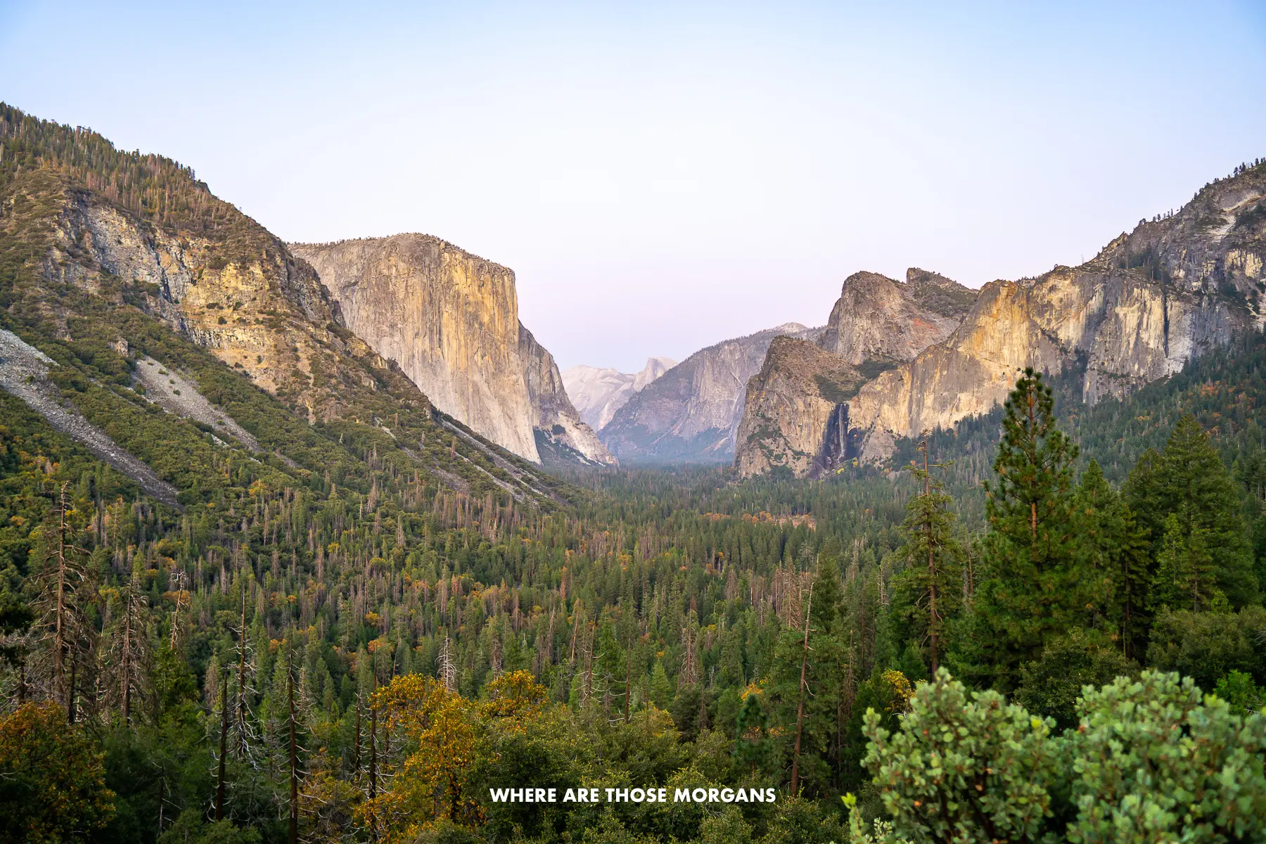 Wide open view of Yosemite Valley from Tunnel View at dusk