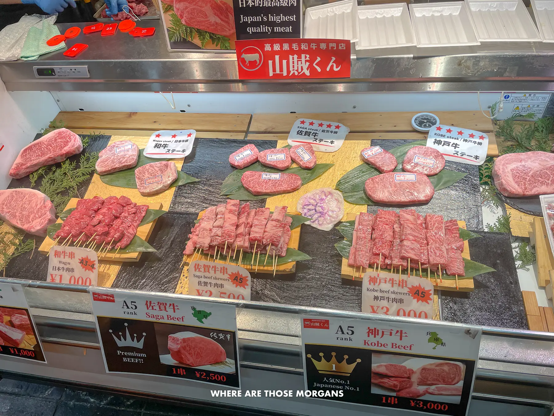Various cuts of beef for sale in a glass display in Japan