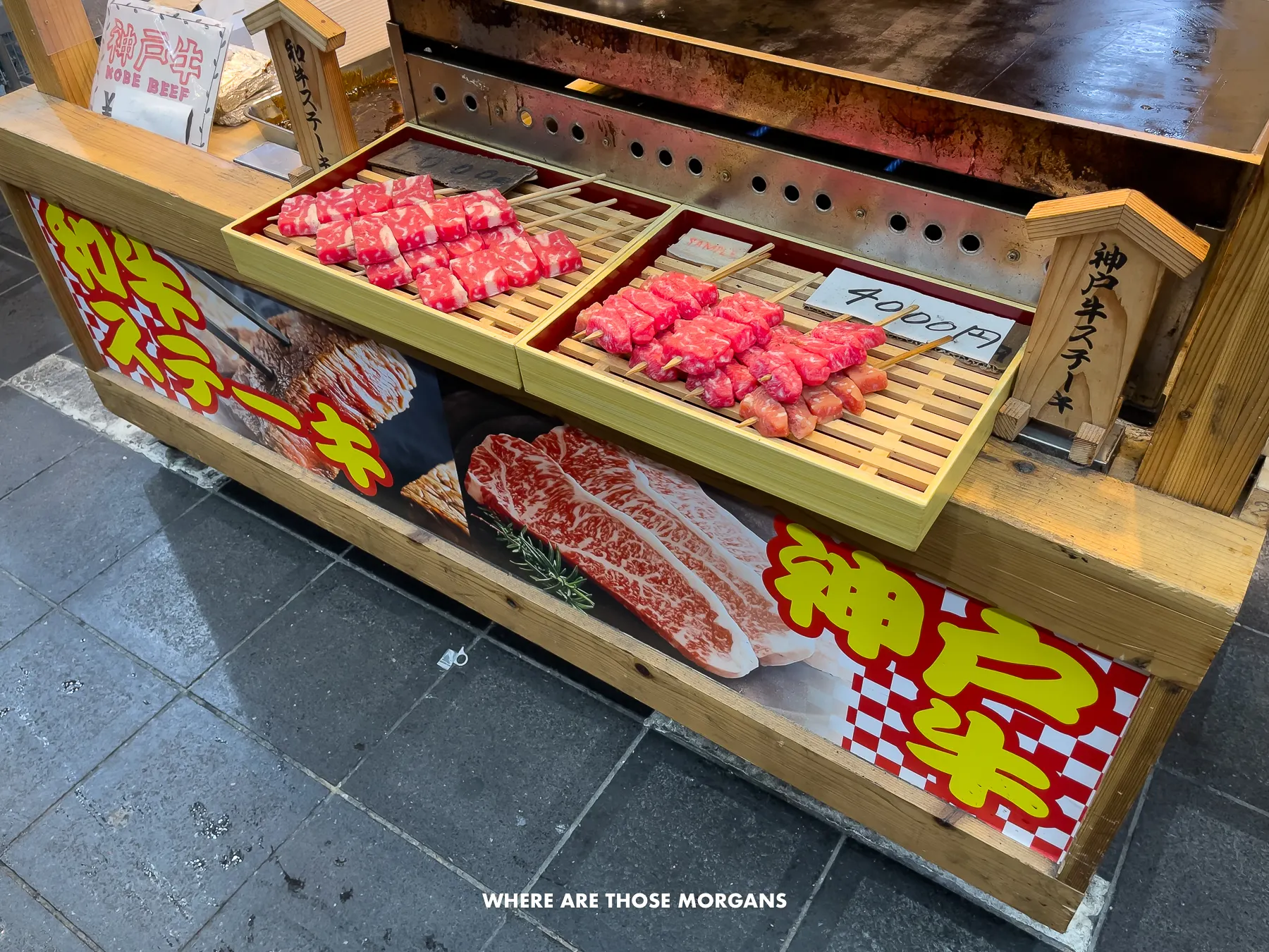 Kobe beef for sale on a wooden stall inside a market in Osaka
