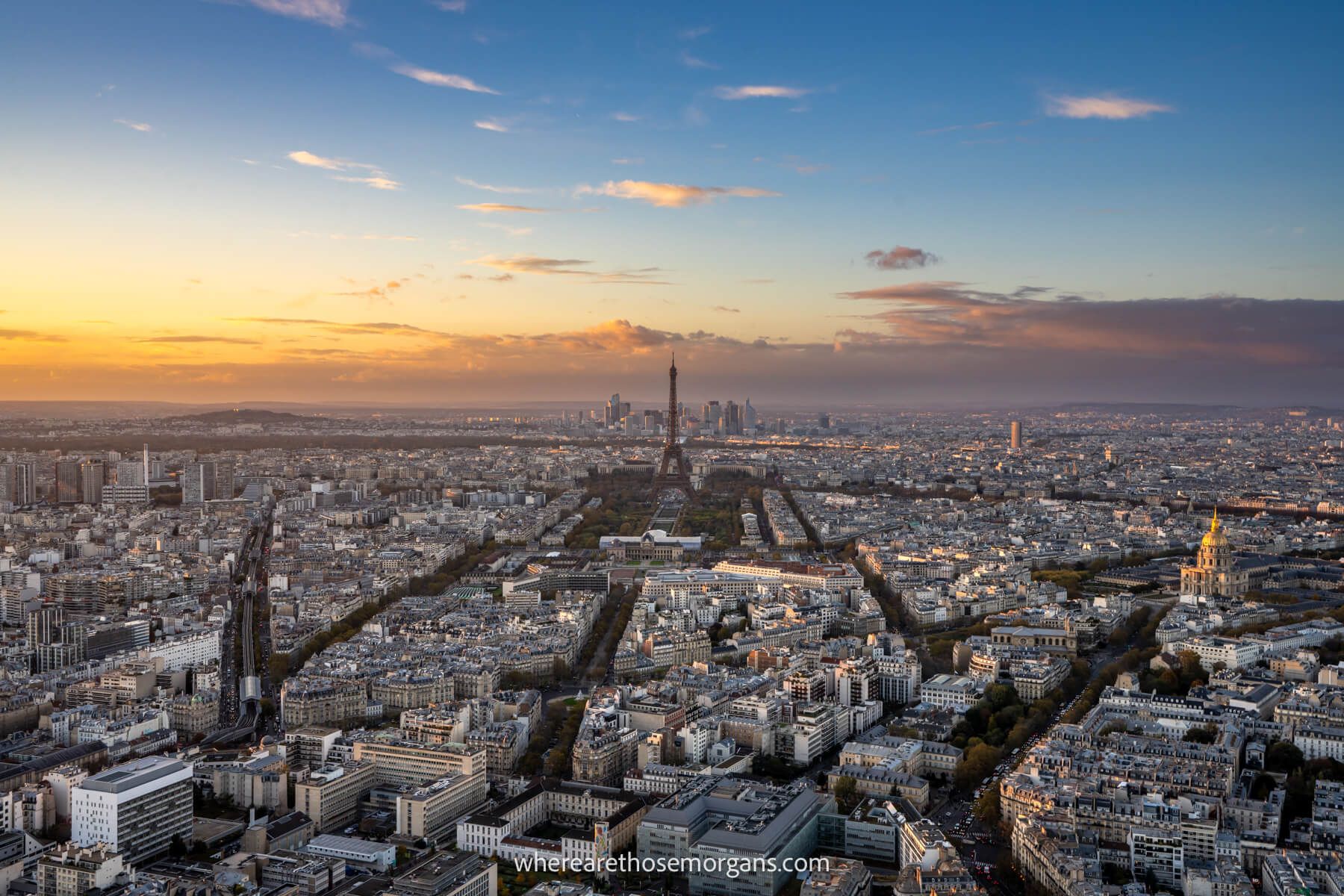 Photo of the city of Paris at sunset taken from the top of Montparnasse Tower