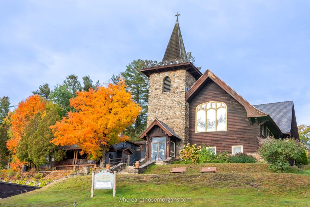 Church in a small village with colorful leaves