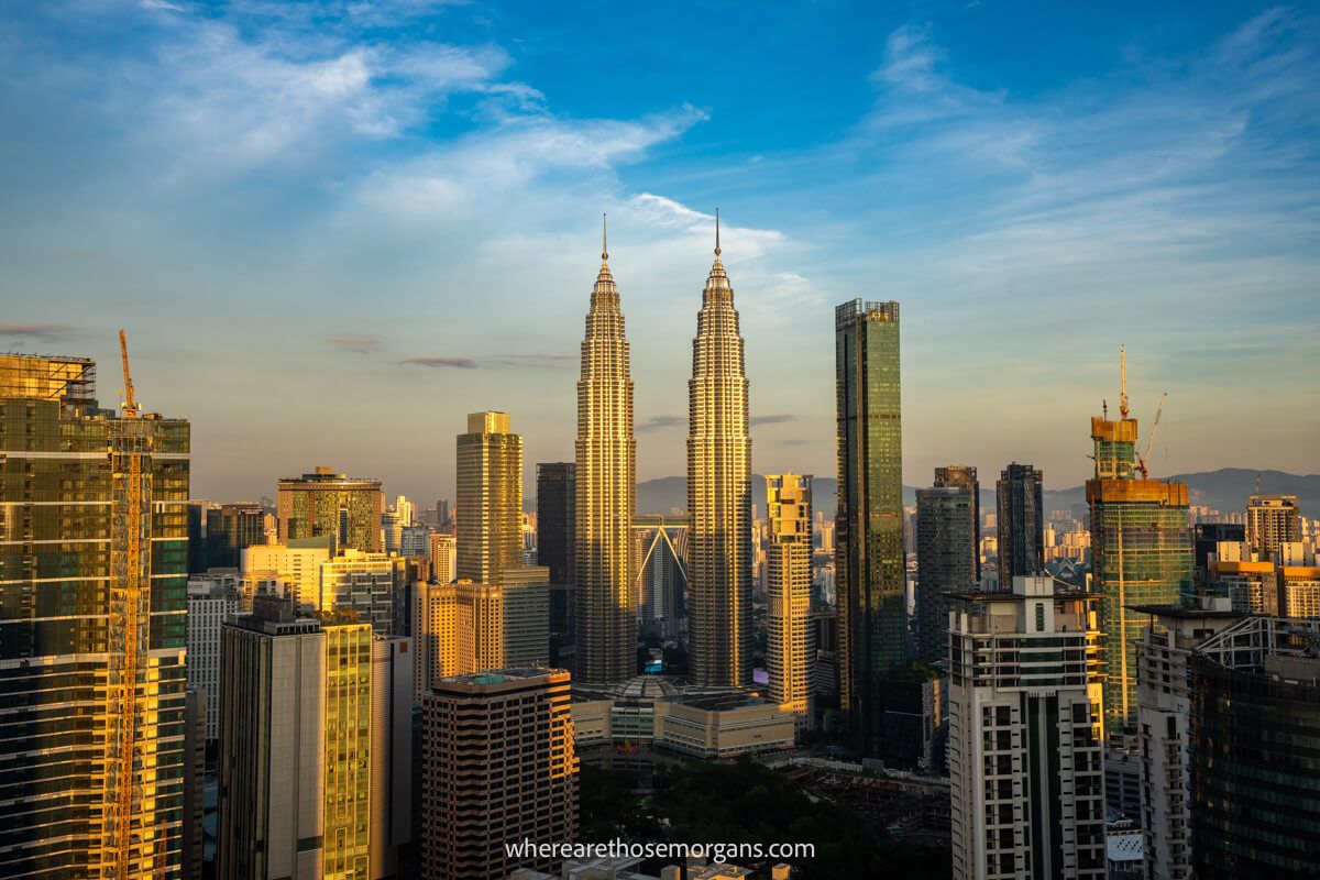 The Petronas Towers in Kuala Lumpur bursting into the sky at sunset