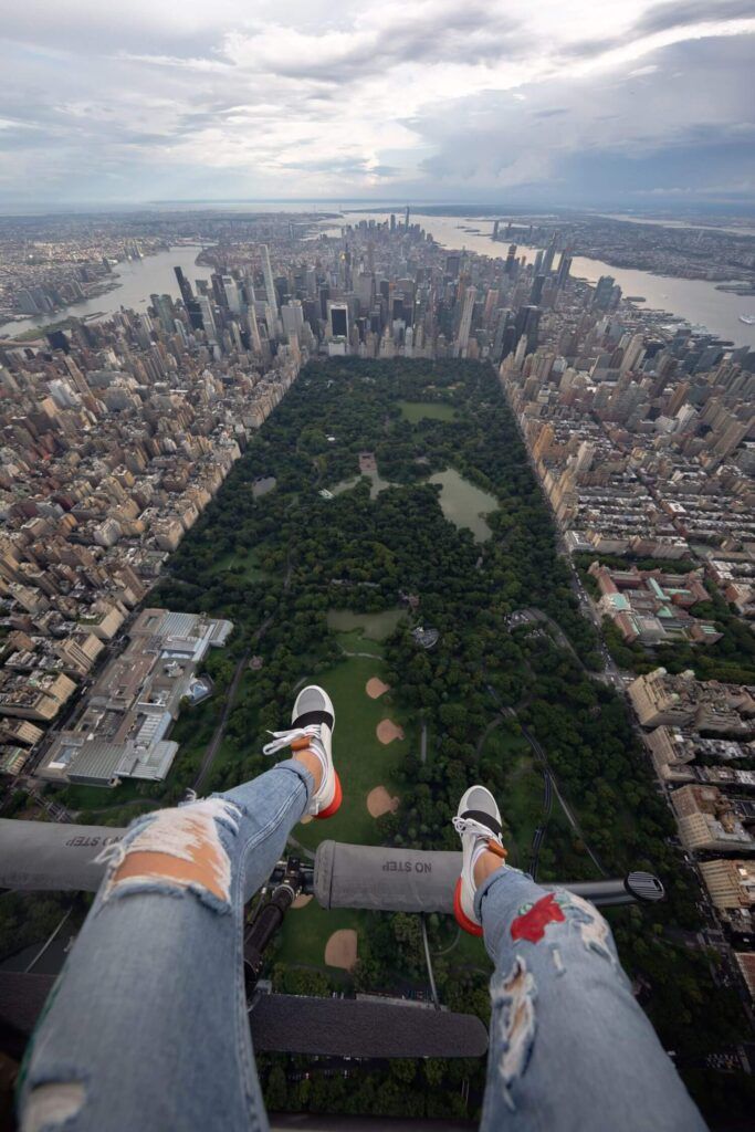 Doors off chopper experience with feet hanging over Central Park