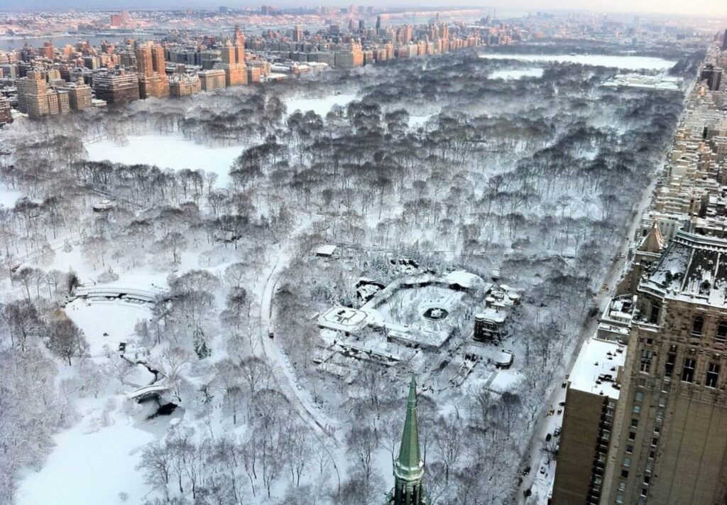 Wings Air Chopper flying high over Central Park in Winter