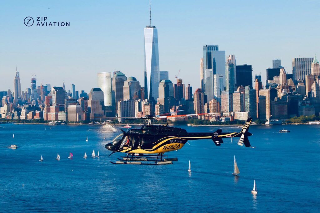Chopper flying over the Hudson River in New York City with Zip Aviation