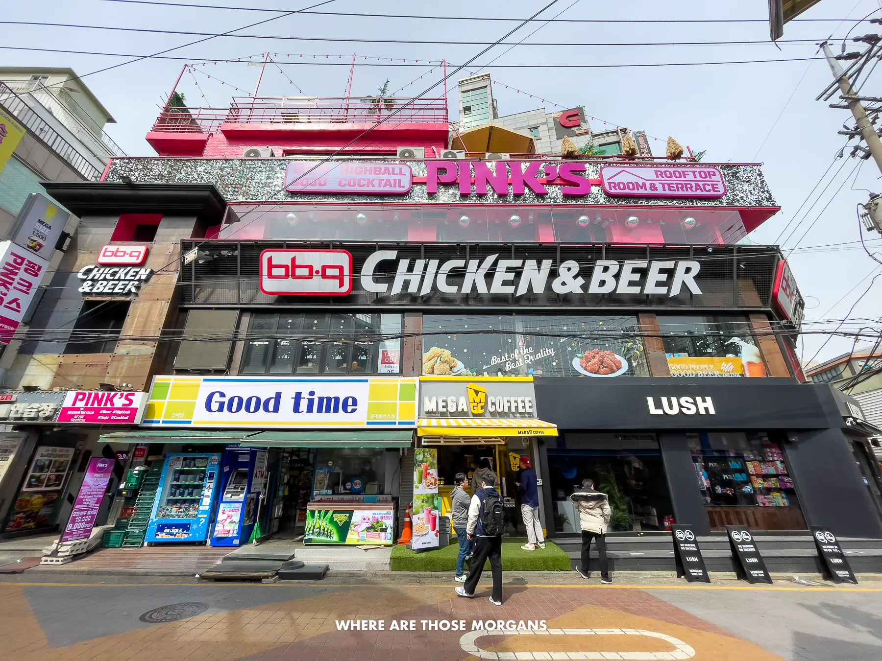 Looking at a building in Seoul housing a BBQ Chicken & Beer chain