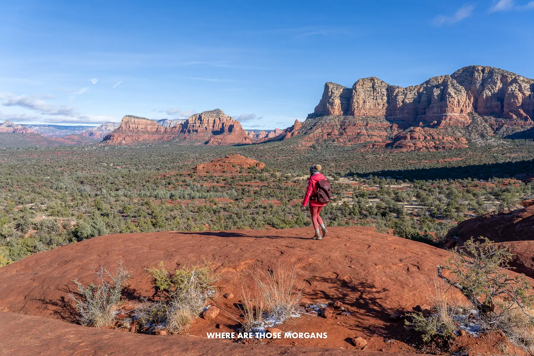Kristen from Where Are Those Morgans walking out to a striking wide-open view half way up Bell Rock
