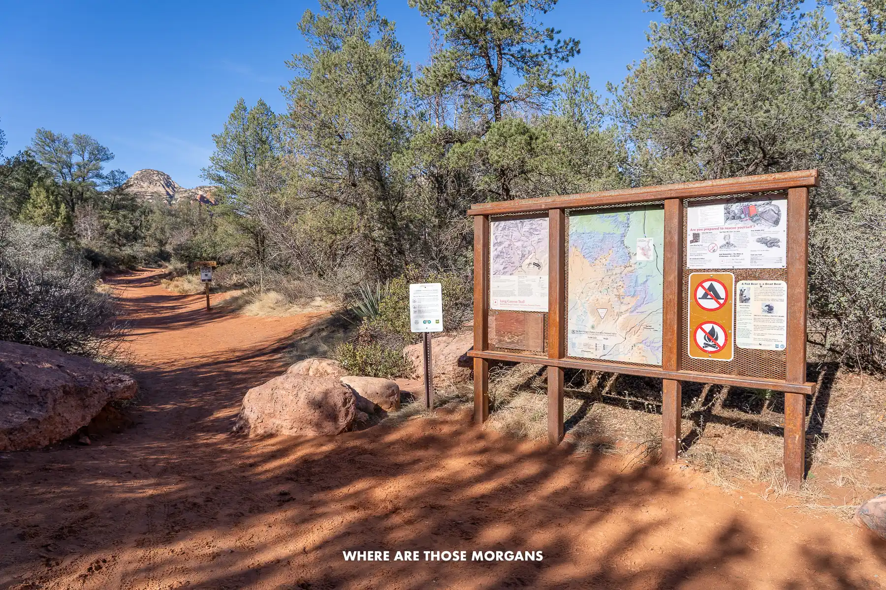Wooden notice board with information at the beginning of a hiking trail in Sedona AZ