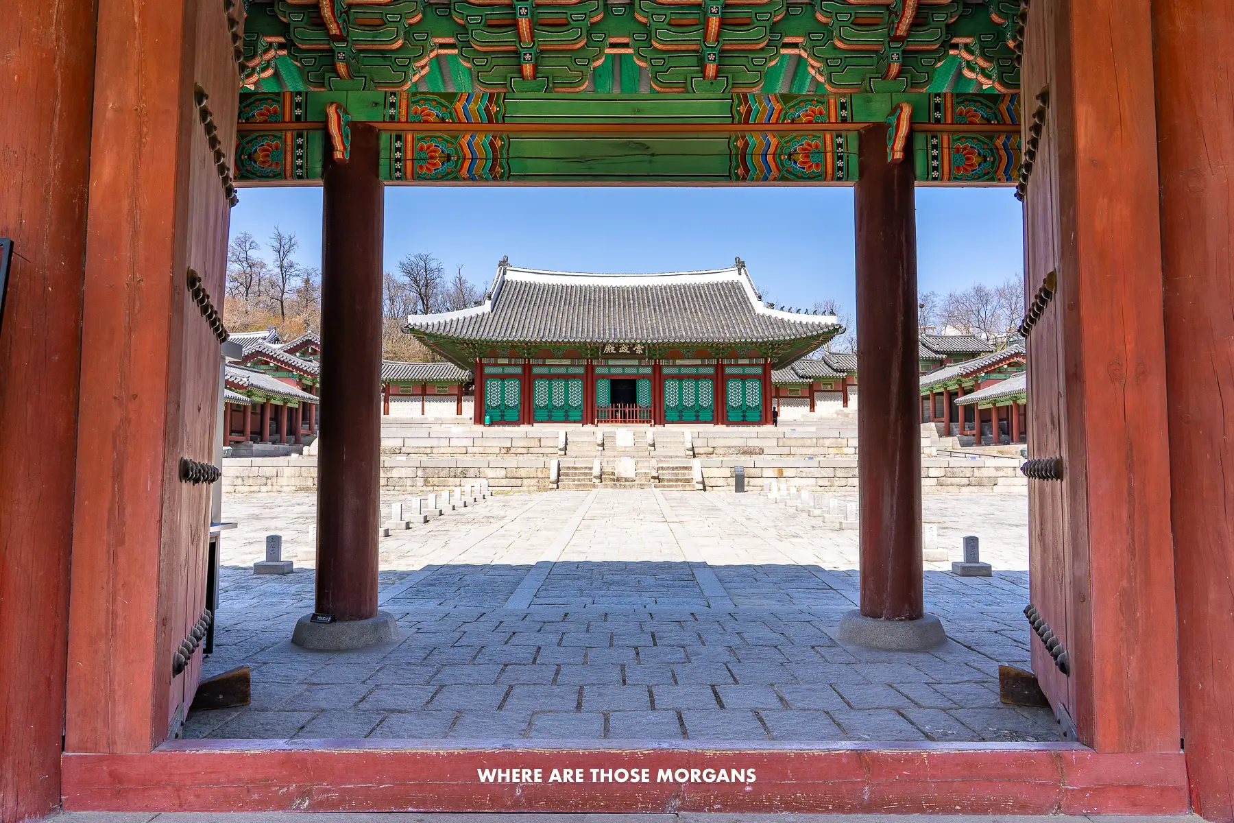 Looking through the striking entrance to Gyeonghuigung Palace in Seoul with no people inside the grounds