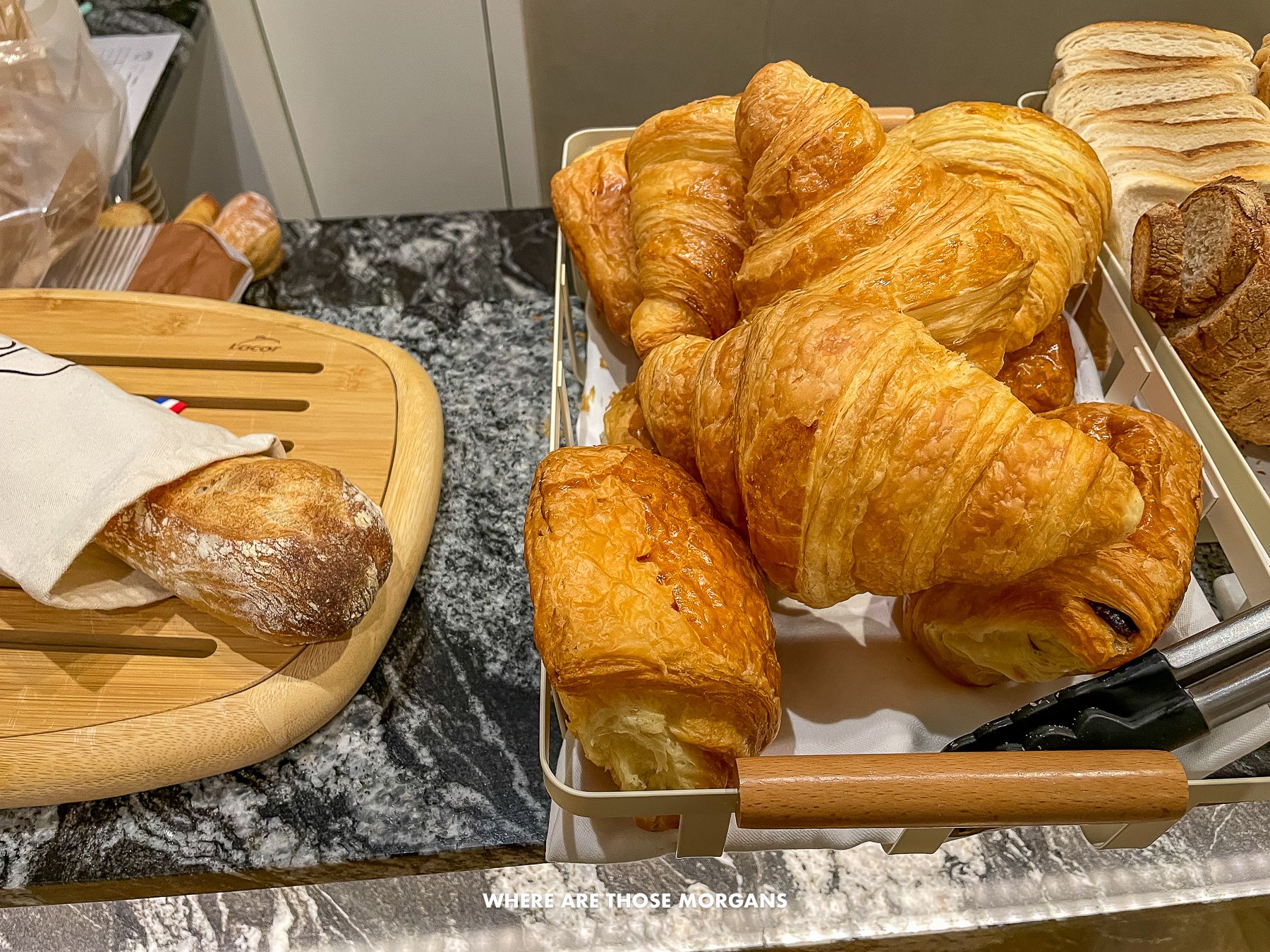 Photo of croissants and bread in a hotel buffet in France