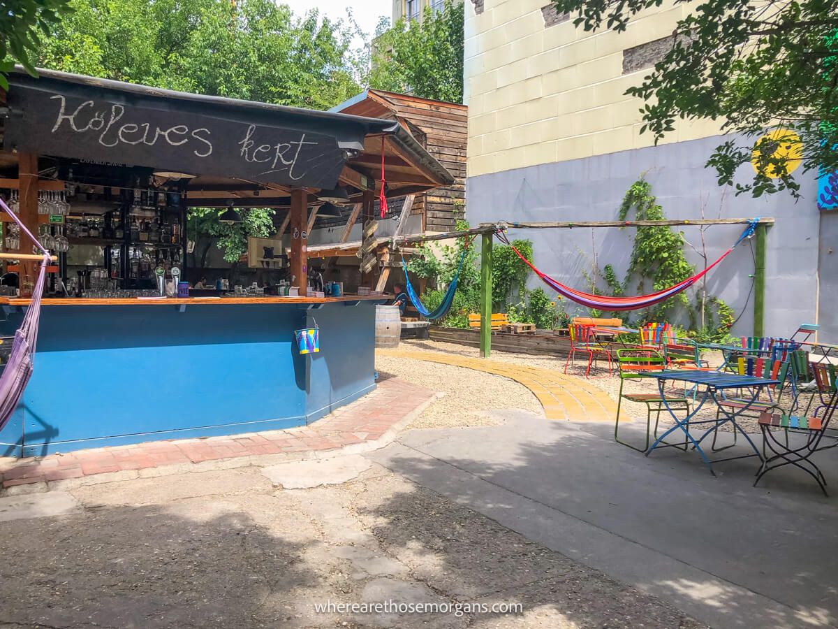 Small courtyard with a bar and hammocks