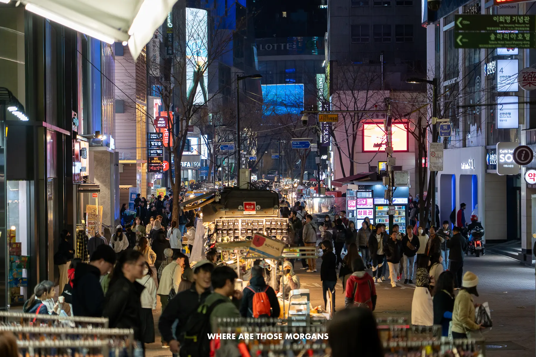 Tourists and locals at Myeongdong night market in Seoul