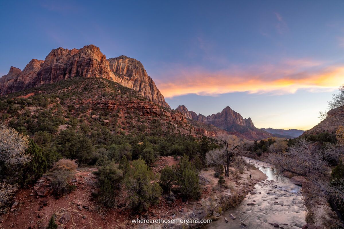 Photo of Zion's red rocks and Virgin River at sunset from Canyon Junction Bridge at the end of the Pa'rus hiking trail